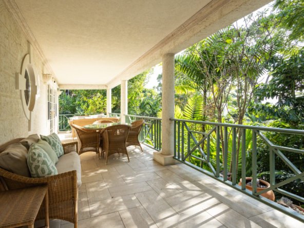 Expansive patio at Mon Caprice, Sandy Lane, offers stunning views and luxurious outdoor living space in Barbados, perfect for relaxation.