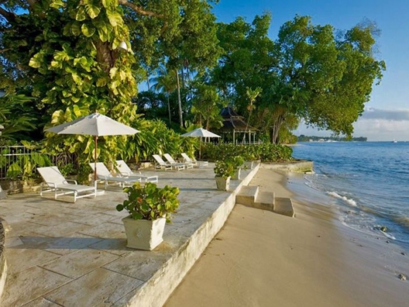 The beachfront living at Oliver Messel designed Mango Bay Villa in Barbados.