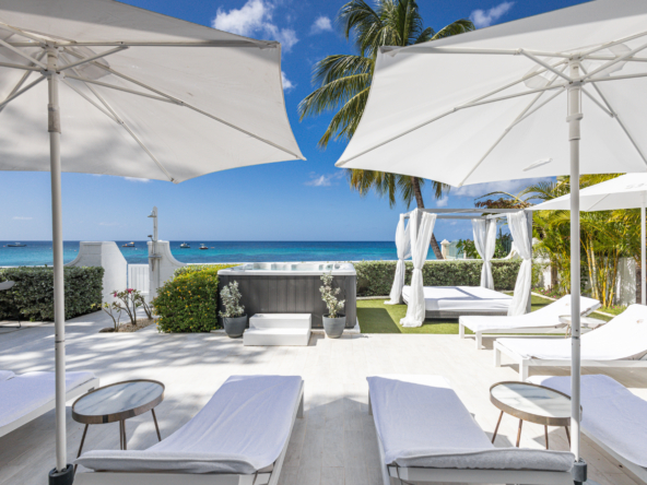 Barbados luxury beachfront villa view from the deck and garden with Caribbean Sea beyond