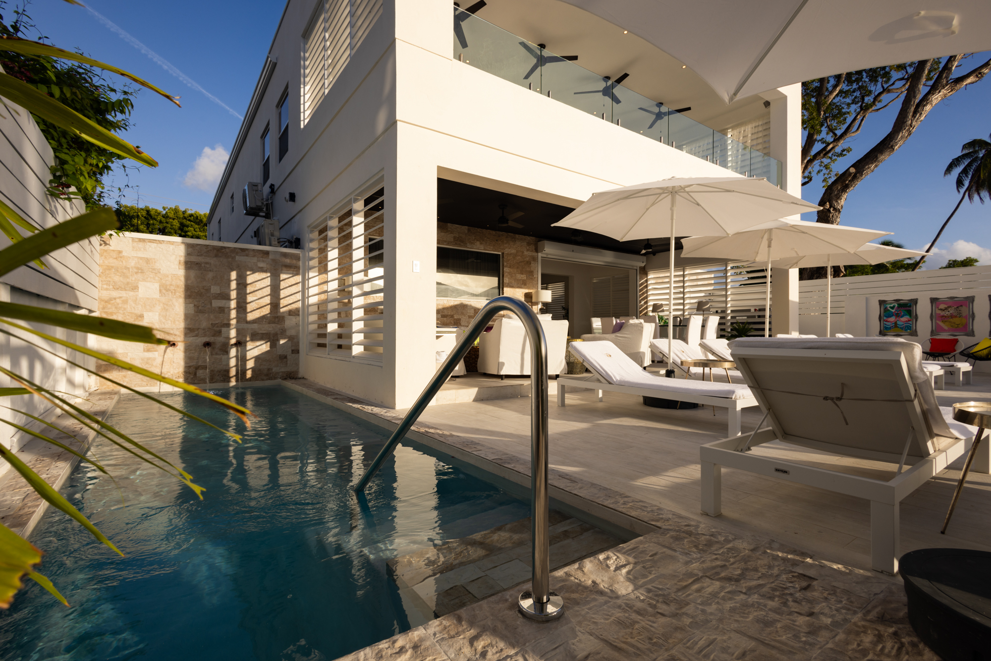 Barbados luxury modern beachfront villa with swimming pool and sun deck