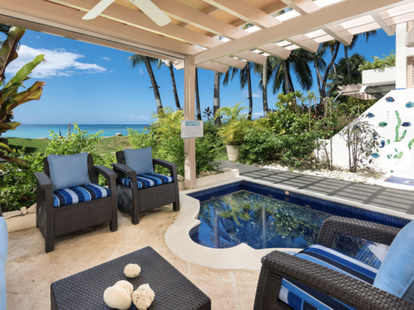 Blacony with plunge pool and blue sky at Reeds House Condominium in Reeds Bay, Barbados.