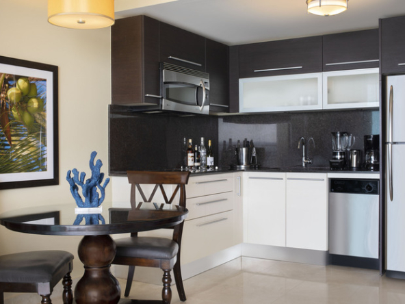 Fully equipped modern kitchen in Apartment No. 509, O2 Beach Club & Spa, offering elegance and functionality for culinary enthusiasts in Barbados.