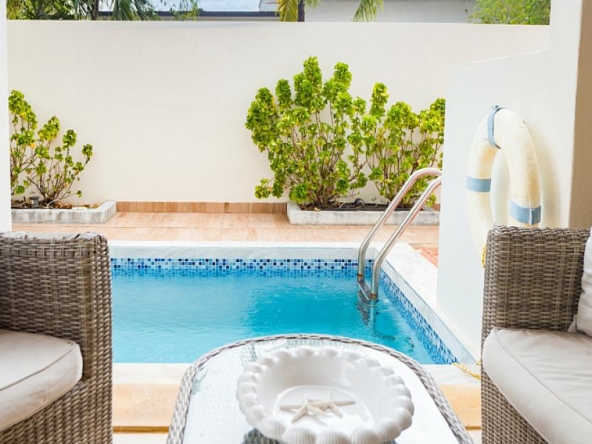 a delightful 3-bedroom colonial-style townhouse plunge pool