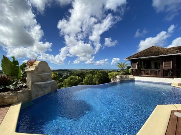 family home for sale in barbados pool view