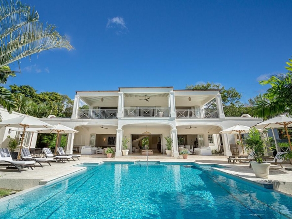 Exterior of modern villa and pool at One Westland Heights, the ultimate villa to rent in a gated community in Barbados.