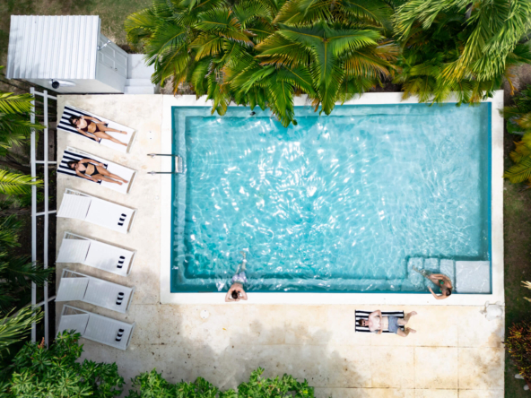 Drone shot of a private pool and sunloungers at luxurious Barbados retreat Harikoa