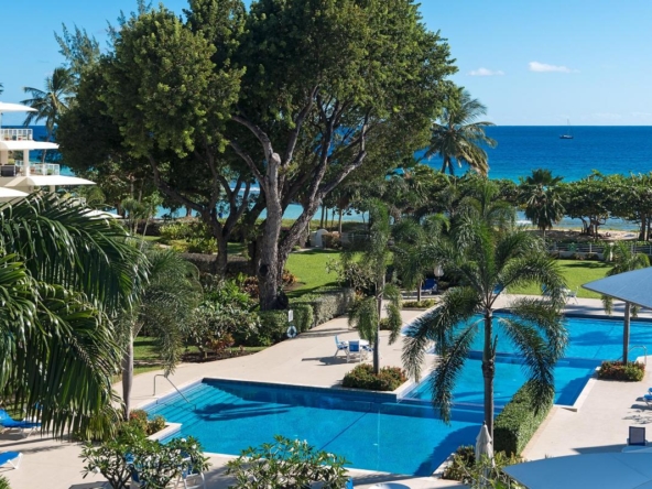 View of pool from two bedroom Barbados vacation rental Palm Beach 410