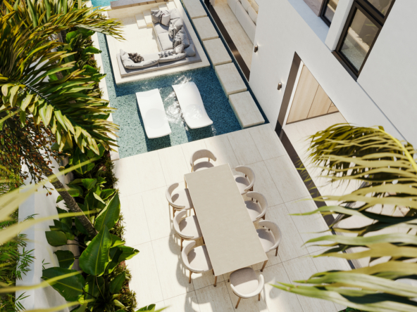 Birds-eye view of luxury investment property in Barbados with swimming pool and terrace with table and chairs, Hummingbird Villa, Callidora.