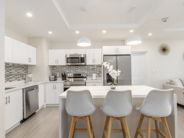 modern white kitchen in first floor apartment Coral Beach 207