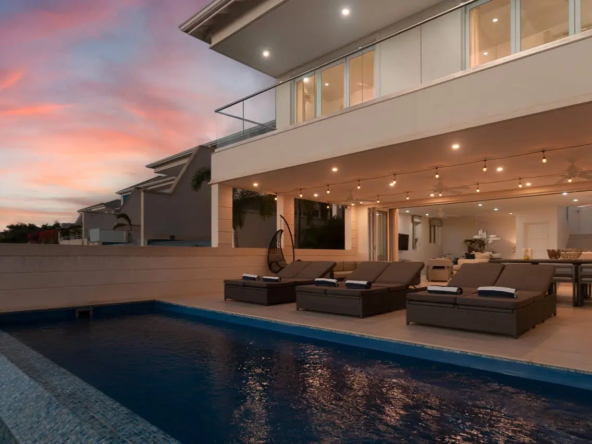 View of poo at dusk of luxury 4-bedroom Villa Westmoreland Hills 44