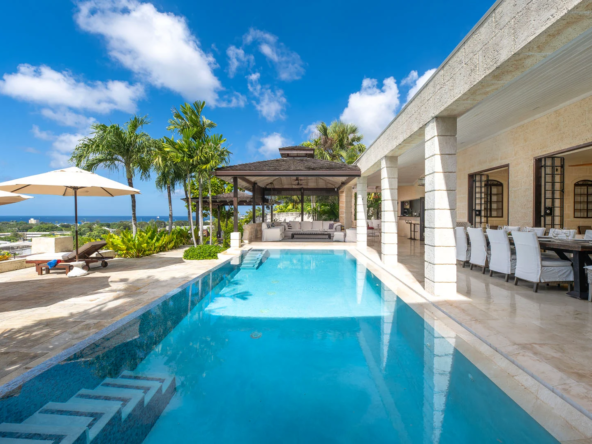 An image of L’Horizon, a luxurious-5-bedroom villa on Barbados’ South Coast. The villa overlooks the Caribbean Sea with an infinity pool, spacious patio, and lush tropical gardens. Ideal for relaxing, socialising, and enjoying panoramic views.