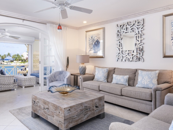 Living room in white and blue in an apartment in Port St. Charles.