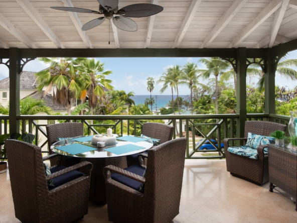 Elegant 2 bedroom ocean view Apartment for sale in Barbados' Beacon Hill, steps from Mullins Beach with rooftop pool and tropical gardens.
